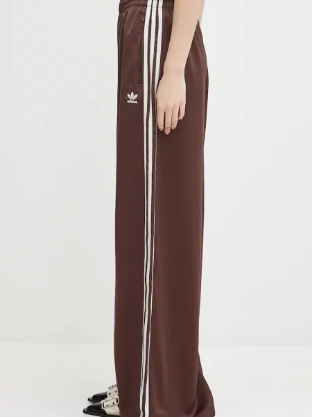 Adidas Originals spodnie dresowe Satin Tp Wl z aplikacją brązowy