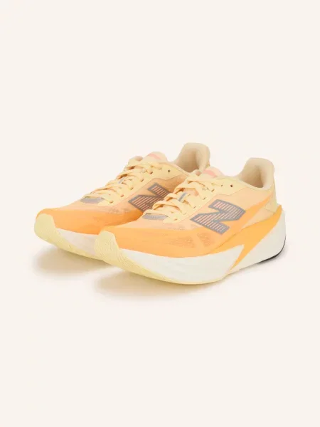 New Balance Běžecké Boty Fuelcell Rebel v5 neonově / stříbrná / tmavě oranžová