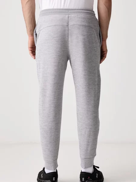 The North Face spodnie treningowe PERFORMANCE szare