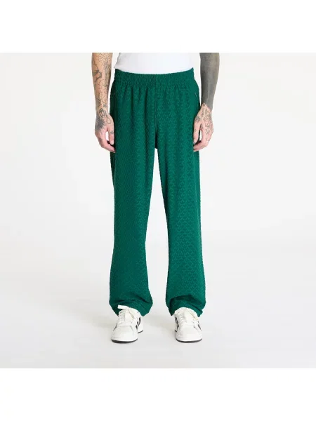 Спортен панталон adidas Originals MONOGRAM TR с изчистен дизайн зелено