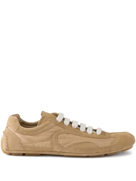 Sneakerși Prada din dantelă
