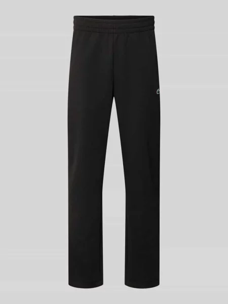 Spodnie dresowe o kroju tapered z dodatkiem bawełny Lacoste Sport czarne