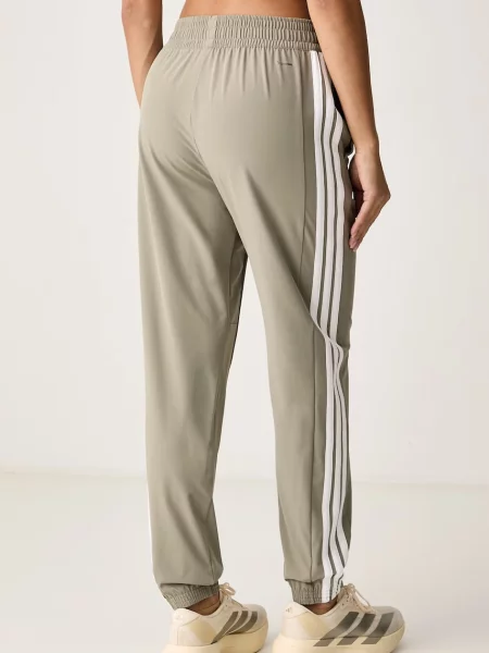 Adidas Performance spodnie dresowe Essentials zielone