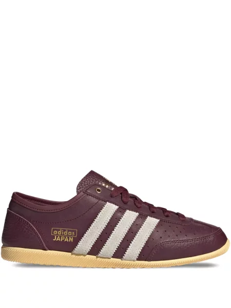Pantaloni Adidas cu dungi din piele roșu