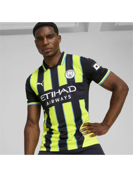 Koszulka wyjazdowa Manchester City PUMA New Navy Yellow Glow Blue niebieska
