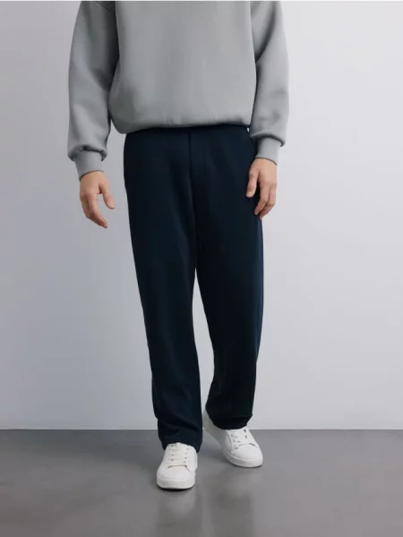 Reserved Spodnie loose fit granatowy