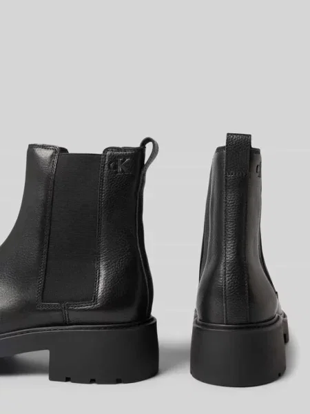 Buty z wyprofilowaną podeszwą i elastycznymi wstawkami Calvin Klein czarne
