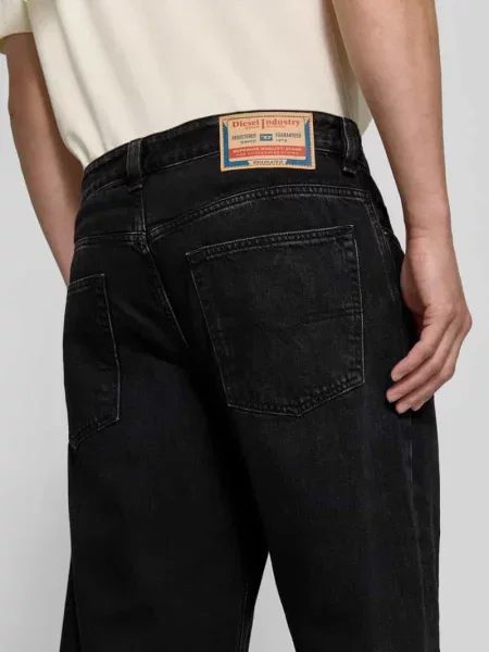 Jeansy o niskim stanie w kroju baggy z naszywką z logo Diesel