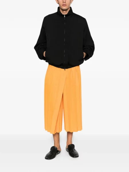 Oříznuté kalhoty Issey Miyake oranžové