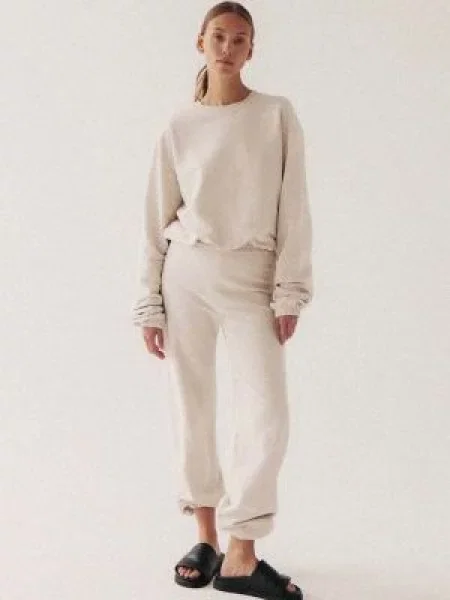 Donji dio trenirke MUUV. bez uzorka bež