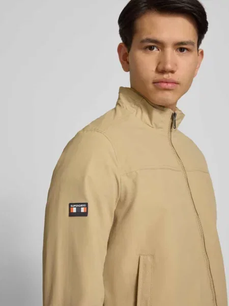 Kurtka ze stójką i wpuszczanymi Superdry beżowa