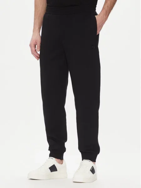 Armani Exchange Teplákové kalhoty černá