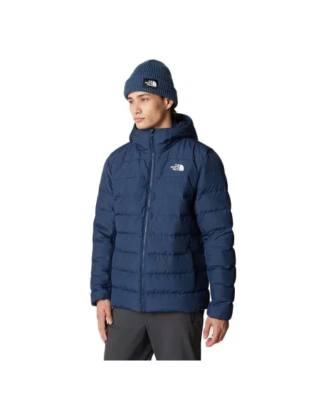 Kurtka The North Face z kapturem niebieska