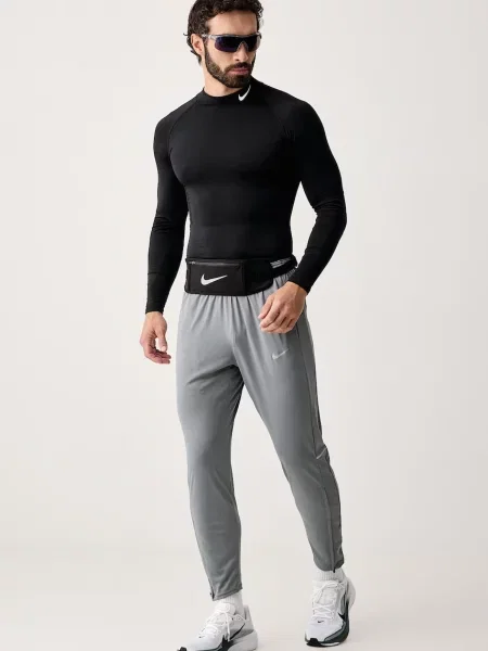 Nike bežecké nohavice pánske Miler Dri-FIT sivá