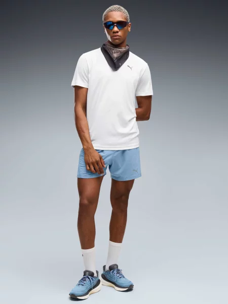Короткие спортивные шорты Puma для бега синие