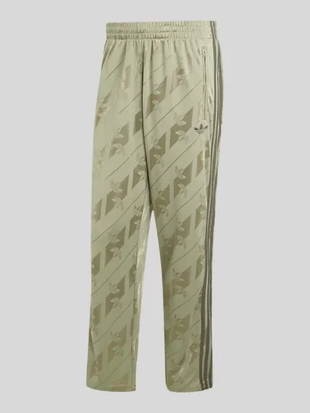 Spodnie dresowe o kroju regular fit z nadrukiem z logo na całej powierzchni Adidas Originals