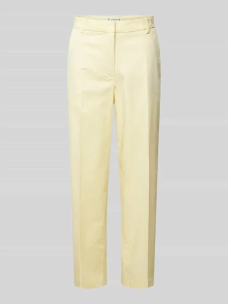 Chinosy o kroju slim fit z mieszanki bawełny i lyocellu Tommy Hilfiger żółte