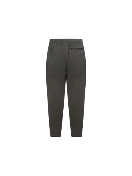 Kompaktowe spodnie dresowe The North Face szare