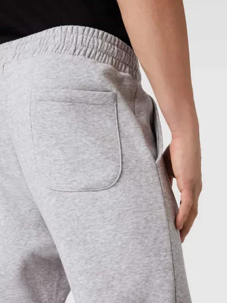 Spodnie dresowe o kroju regular fit z wpuszczanymi model GORDON' Jack & Jones
