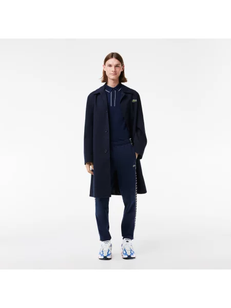 Lacoste Spodnie Dresowe O Zwężanym Kroju Z Nadrukiem granatowy