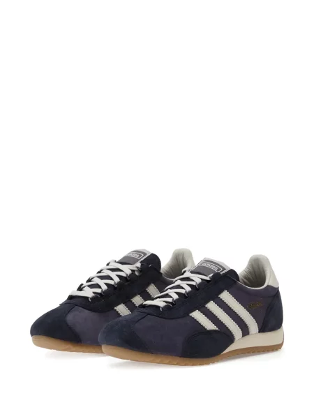 Pantaloni palazzo Adidas cu dungi cu decolteu în V negru