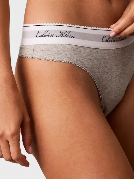 Стринги Calvin Klein серые