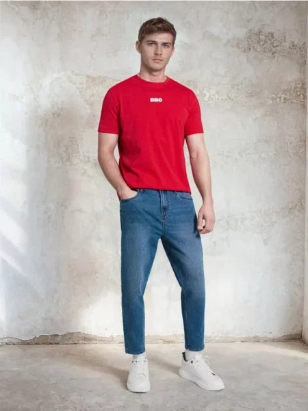 Sinsay Jeansy carrot z efektem sprania niebieski