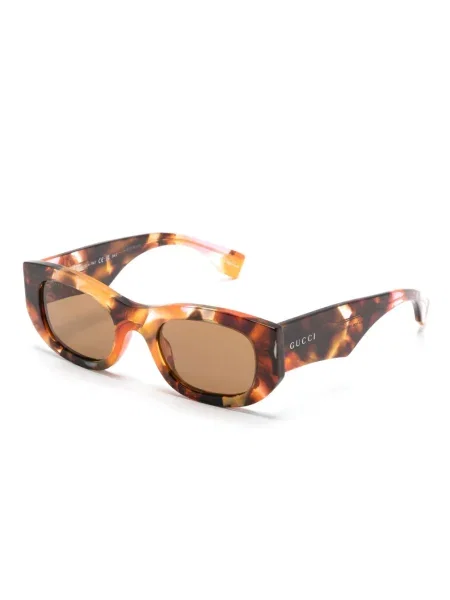 Saulės akiniai Gucci Eyewear oranžinė
