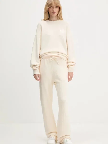 Штани з домішкою вовни adidas Originals Knitted Pants однотонні бежевий