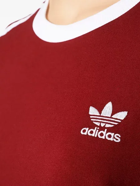 Legginsy Adidas do biegania z nadrukiem z dekoltem w serek czerwone