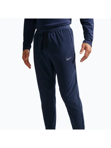 Pantaloni de alergare pentru bărbați Nike Stride Dri-Fit Woven midnight navy albastru închis