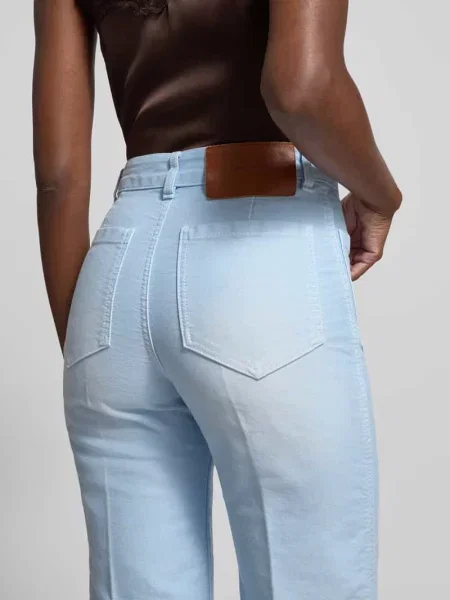Jeansy o kroju wide fit z nakładanymi Victoria Beckham