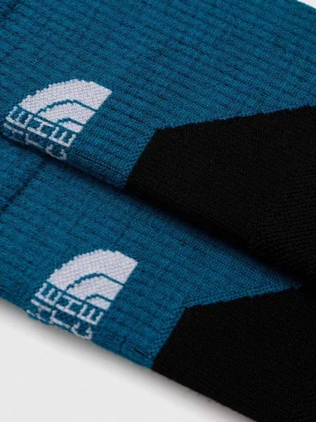Nogavice s primesjo volne The North Face modra