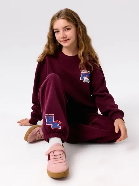 Sinsay Tepláky jogger Hello Kitty kaštanová