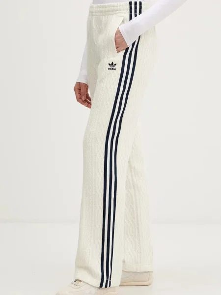 Спортивні штани adidas Originals з аплікацією бежевий
