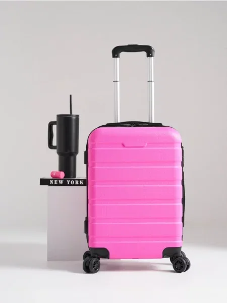 Жорстка дорожня валіза на колесах фуксія