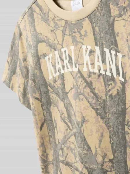 Koszulka z nadrukiem logo krój regular fit Karl Kani beżowa