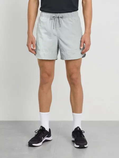 Nike Tréninkové Šortky N.A.C. světle šedá