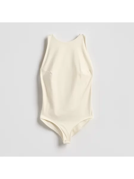 Reserved Jednobarevné body slim fit krémová