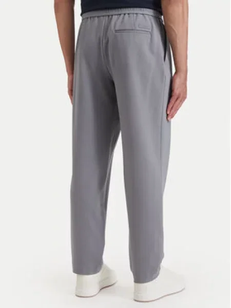 Calvin Klein Szövet nadrág Tapered Fit szürke