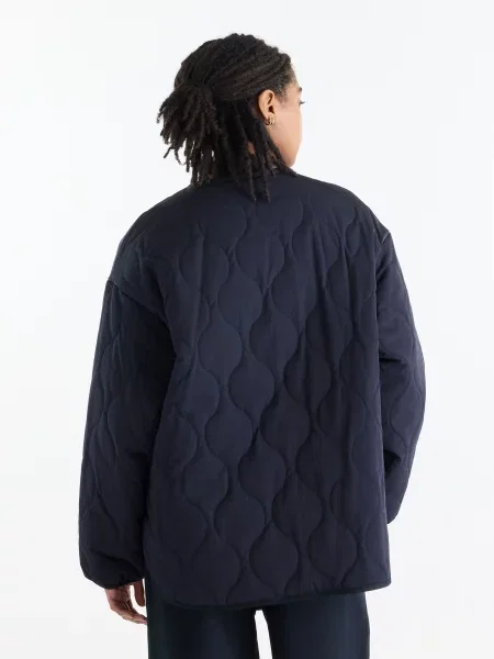Бомбер New Balance Quilted Bomber синій