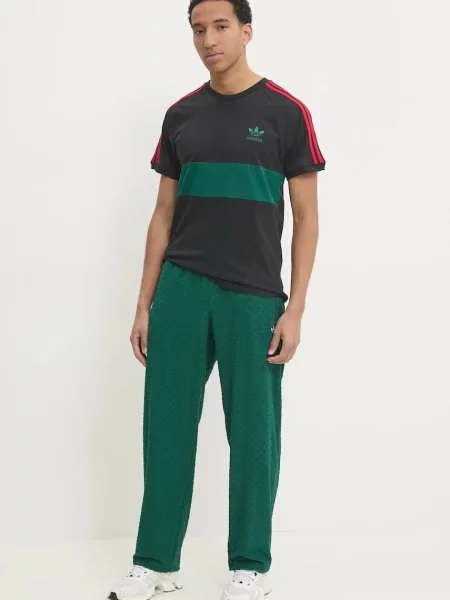 Спортивні штани adidas Originals MONOGRAM TR однотонні зелений