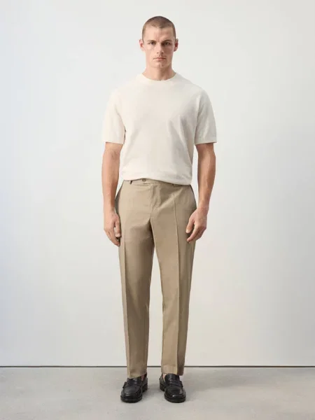 Spodnie regular fit z mieszanki lyocellu i bawełny Mężczyzna 42 MANGO MAN brązowy