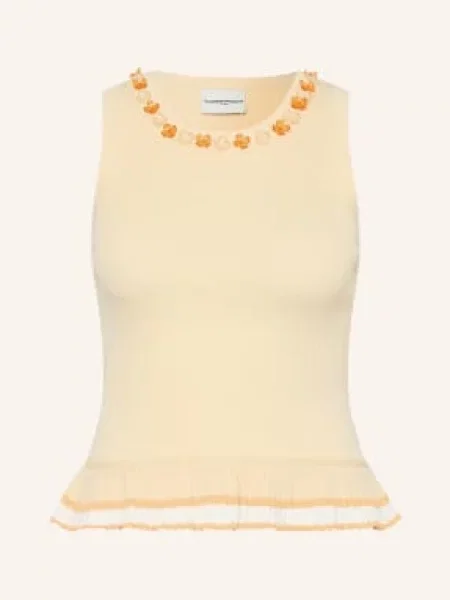 Dzianinowy top Claudie Pierlot z falbankami biały