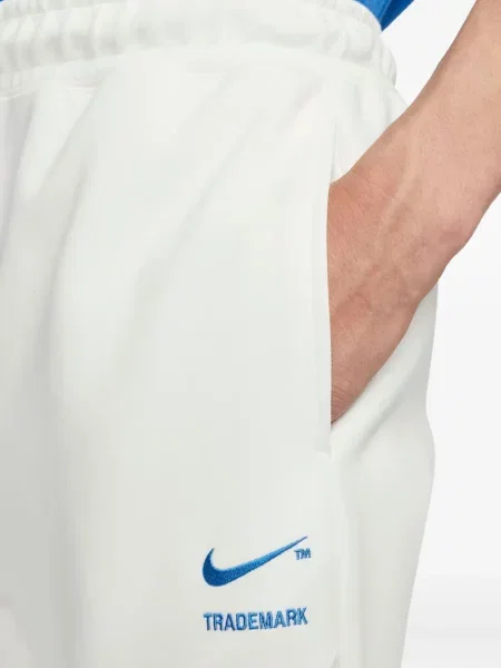 Pantaloni Nike din fleece alergare cu broderie negru