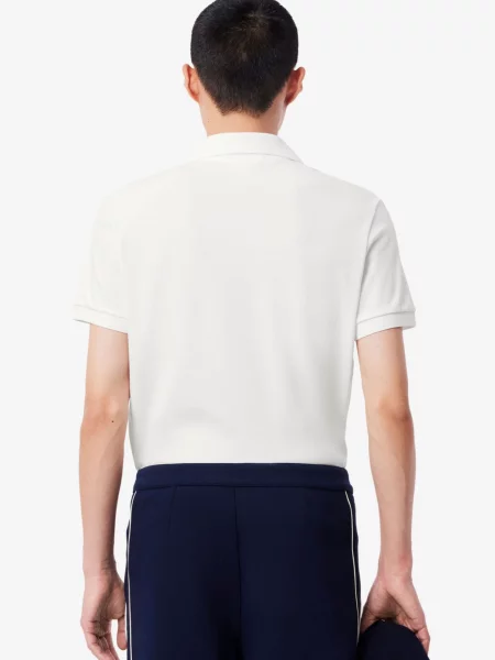 Поло Lacoste белое
