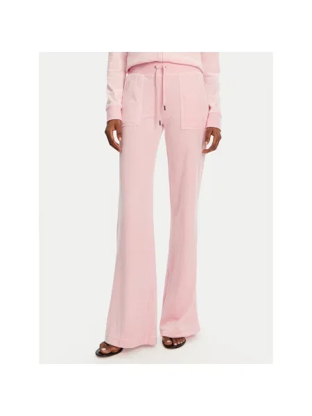 Расклешенные спортивные штаны Juicy Couture розовые
