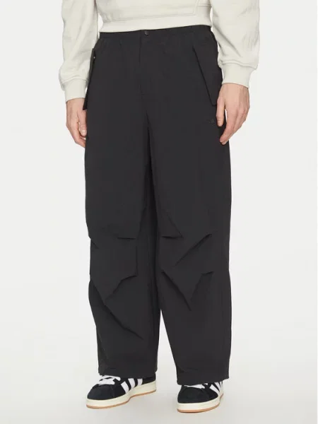 Hlače iz tkanine adidas črna