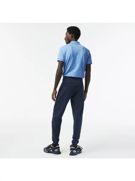 Lacoste Spodnie Dresowe Slim Fit Dwustronne niebieskie