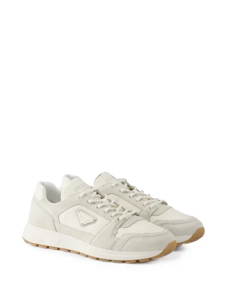 Sneakerși Prada din piele de căprioară